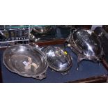 A silver plated breakfast warmer, a plated two-handled dish, a plated entree dish and cover and a