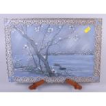 A Japanese porcelain tile with Prunus tree in winter, 15 1/2" x 10 3/4"