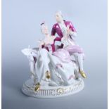 A Royal Dux porcelain figure group, lovers, in period costume, 11" high