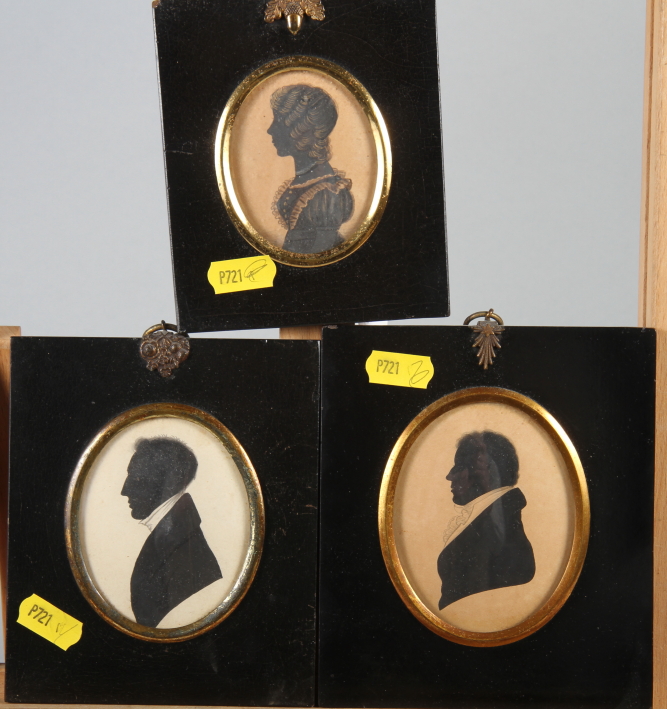 Two early 19th century portrait silhouettes, unknown gentlemen, and a similar companion portrait