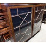 A mahogany bookcase with dentil cornice and astragal moulded glazed doors, on bracket feet, 48"