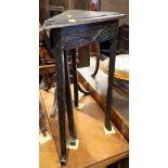A 19th century carved oak triangular drop leaf occasional table, on splay supports, 24" wide
