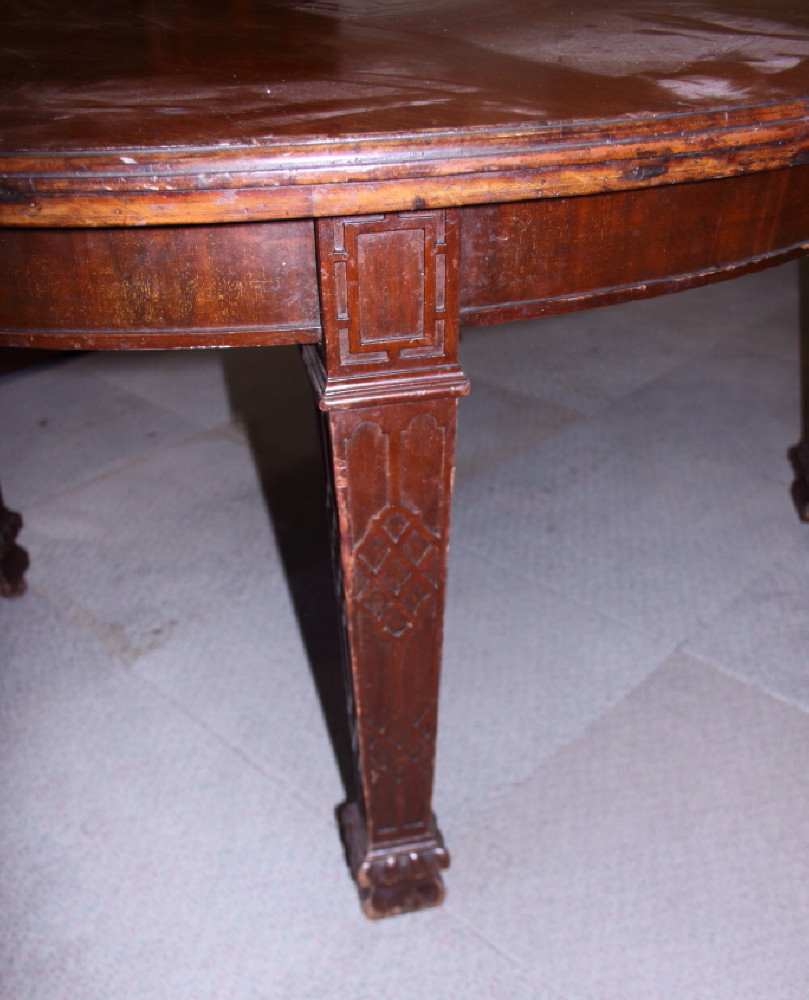 An early 20th century mahogany oval extending dining table, on square supports decorated blind - Image 2 of 2