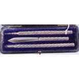 A Sampson Mordan & Co silver dip pen with spiral fluted decoration together with a matching