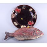 A Palissy style charger with crustacean decoration, 14" dia (small chips) and a red snapper shape