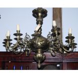 A 19th century Continental brass twelve-branch chandelier of 17th century design