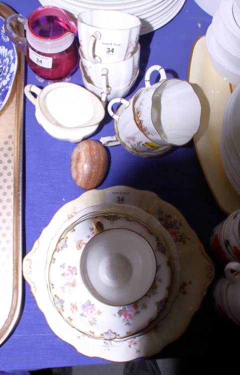 An early 20th century Royal Crown Derby pattern part teaset, decorated in the "Derby Posie"