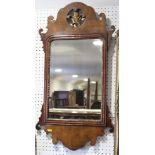 A walnut and gilt wall mirror of early Georgian design with Prince of Wales feathers crest, plate