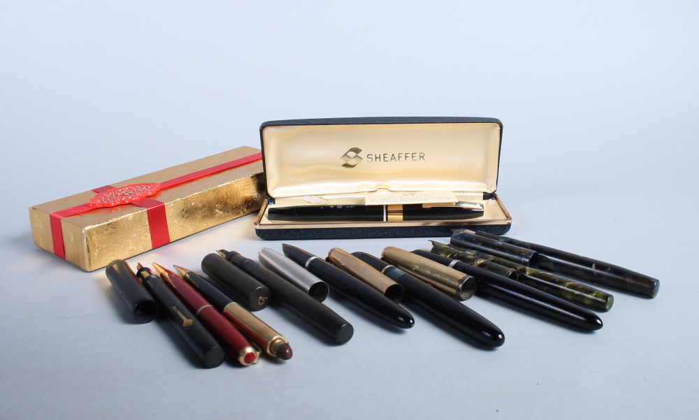 A Sheaffer fountain pen, an Onoto fountain pen with rolled gold cap, a number of other vintage