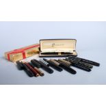 A Sheaffer fountain pen, an Onoto fountain pen with rolled gold cap, a number of other vintage