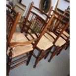 A set of ten 18th century design spindle back dining chairs with rush seats