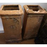 A pair of square terracotta chimney pots, 33" high