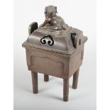 A Chinese rectangular bronze censer, on four supports, with Kylin finial, 6" across