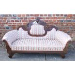 A Federal design settee, upholstered in a floral and striped fabric
