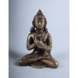 A Chinese bronze figure of a seated buddha, 3" high, and a Chinese miniature bronze bark effect