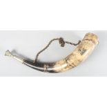 A 19th century brass mounted hunting horn with applied decoration, 12" long