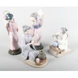 A group of four Spanish porcelain figures, including two matt finish figures, a Casades figure, a