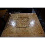 A French fruitwood square topped marquetry games table, on square tapered supports with later