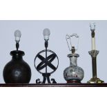 A brass Corinthian column table lamp, an Oriental vase (now converted to electricity) and two