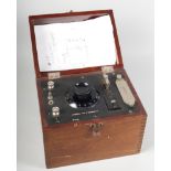 A Gambrelle Type D Wavemeter, in oak case, a Bakelite bowl and a pewter serving spoon