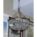 A shallow glass baguette chandelier with gilt metal frame
