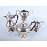 An Edwardian four-piece silver teaset, Sibray, Hall & Co, London 1902, comprising a teapot, a coffee