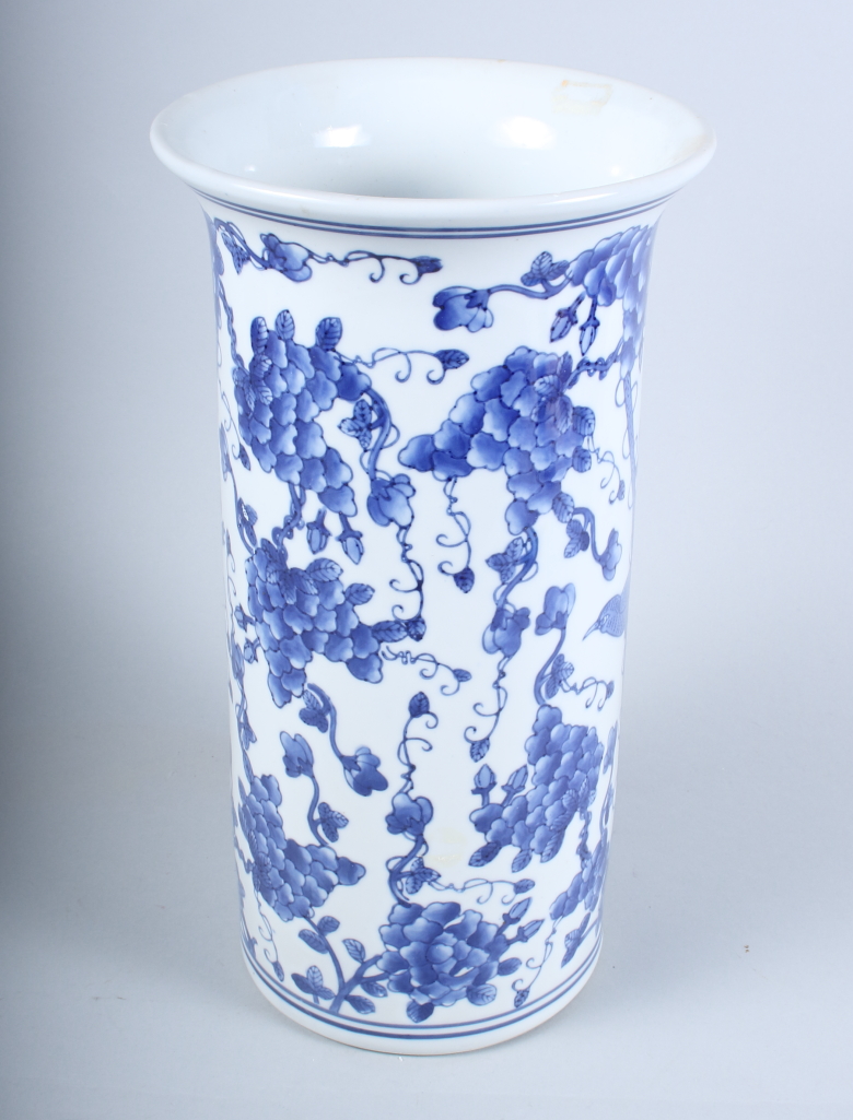 A blue and white cylinder vase with bird and vine decoration, 14" high