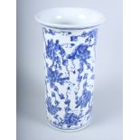 A blue and white cylinder vase with bird and vine decoration, 14" high