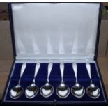 A cased set of six teaspoons, a number of other silver spoons, etc, a silver napkin ring, two silver