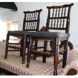 A set of eight 18th century design oak dining chairs with rush seats, fitted squab cushions, and