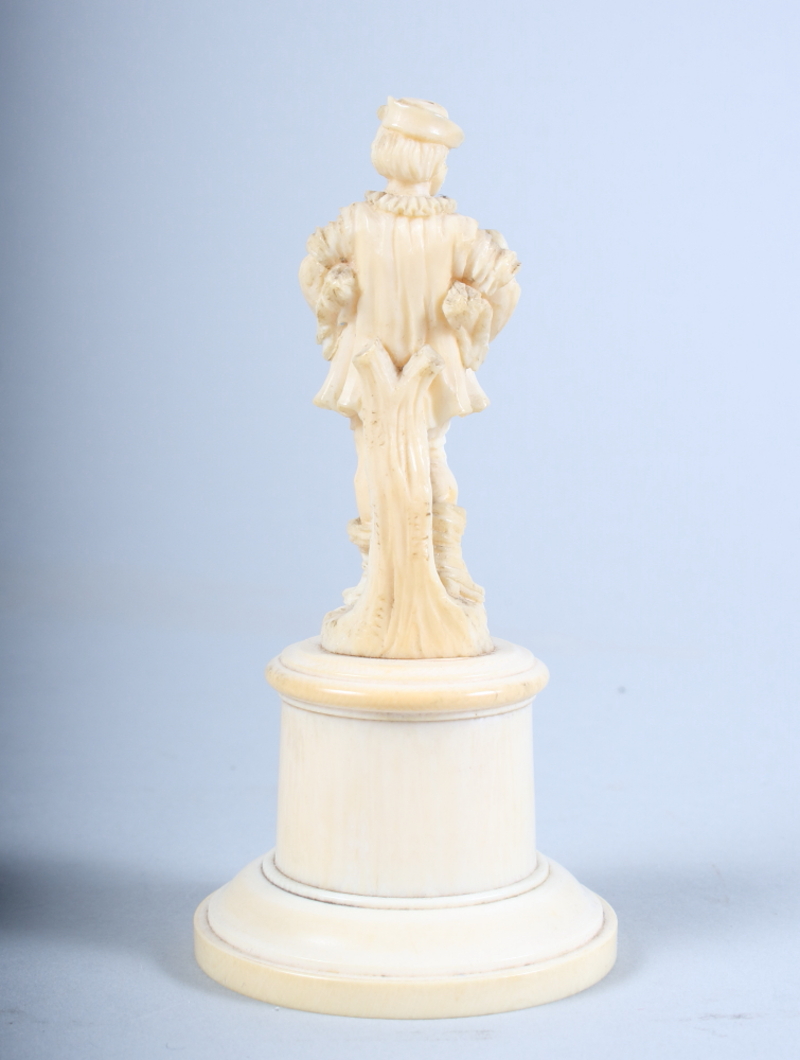 A 19th century Dieppe carving of a gentleman with geese under his arms, on plinth base, 4 1/2" high - Image 2 of 8