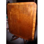 A 19th century mahogany tilt top breakfast table with broad satinwood crossbanded edge, on turned