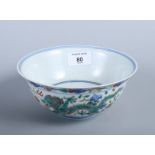 A Chinese porcelain Doucai bowl, decorated dragons and phoenix, Chen Lung seal mark to base, 6 1/