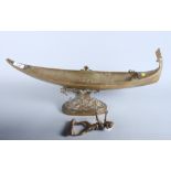 A brass model of a gondola and gondolier, 23" long