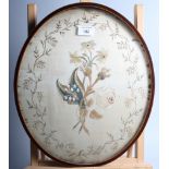 A 19th century oval pole screen panel, inset floral embroidered silk panel