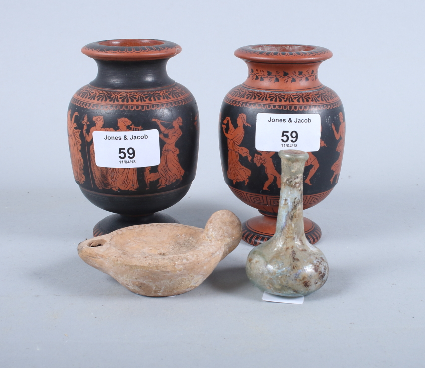 A pair of Greek red figure vases, 4 1/2" high, a Roman ceramic oil lamp and a Roman glass vial