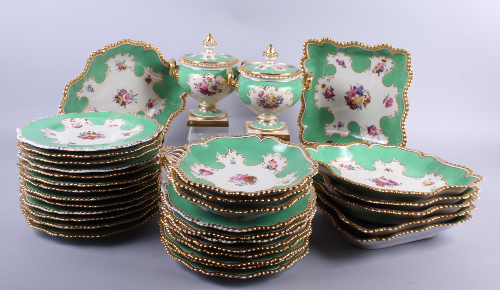 A Worcester Flight Barr and Barr part dessert service, decorated green and gilt borders with hand