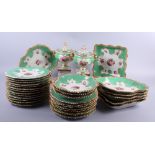 A Worcester Flight Barr and Barr part dessert service, decorated green and gilt borders with hand