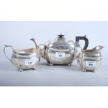 A Georgian design silver teaset with ebonised handles, Chester 1939, 25.8oz troy approx