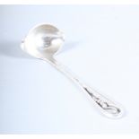 A Georg Jensen stylised "Blossom" pattern sauce ladle, a Tiffany & Co silver lidded mustard and a