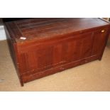 A Danish teak box of tongue and groove construction with hinged top, 34" wide