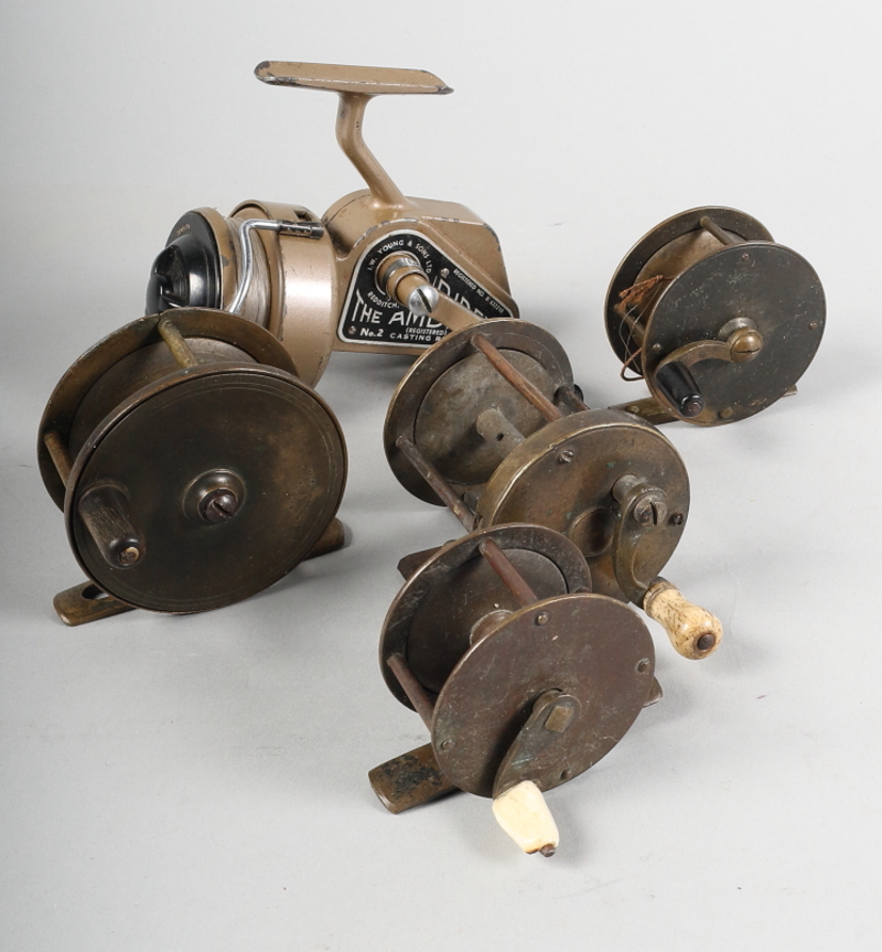 A three-section fishing rod, a brass fishing reel by Carter & Co and a tackle box containing