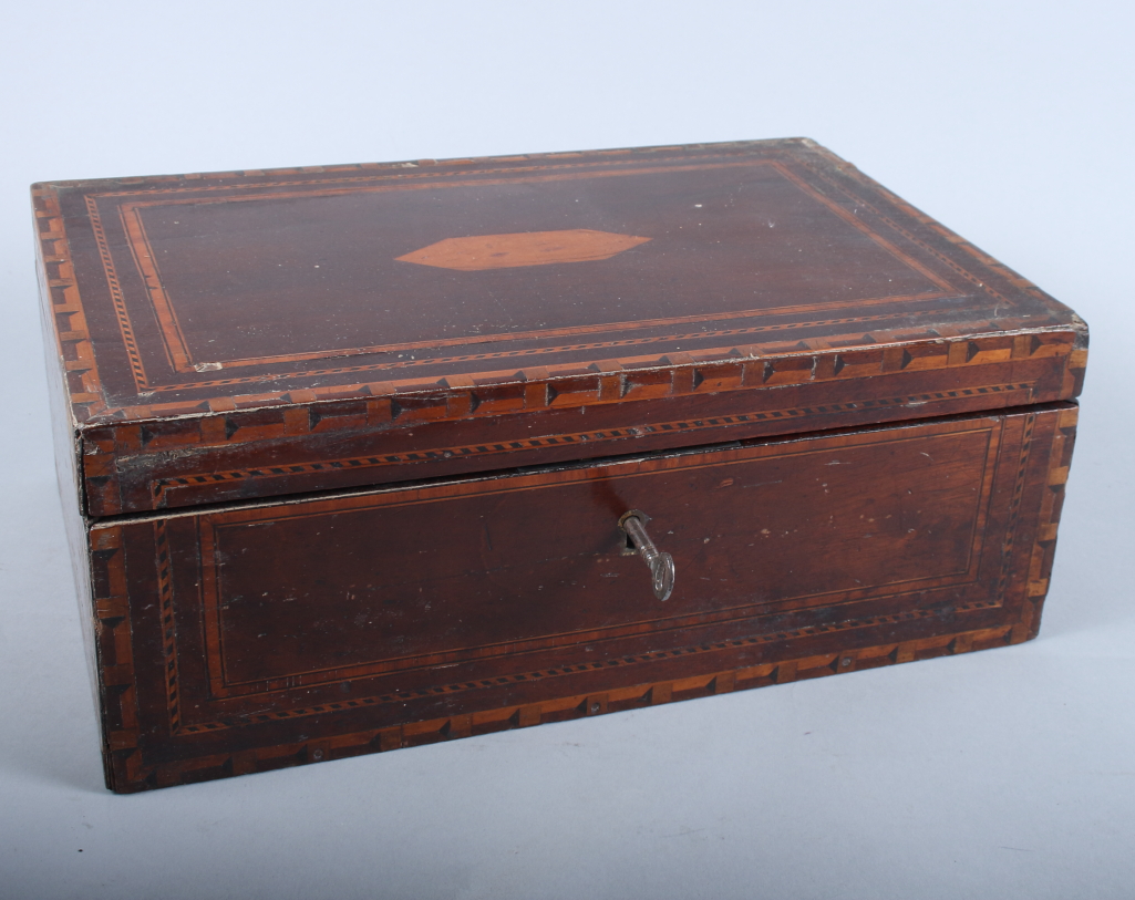 A 19th century mahogany and inlaid workbox with hinged lid enclosing fitted tray and assorted sewing