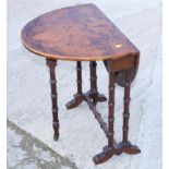 A late 19th century walnut Sutherland table, 28" wide