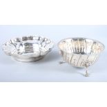A silver scalloped edge bowl, retailed by Harrods, together with a silver bowl, on three lion paw