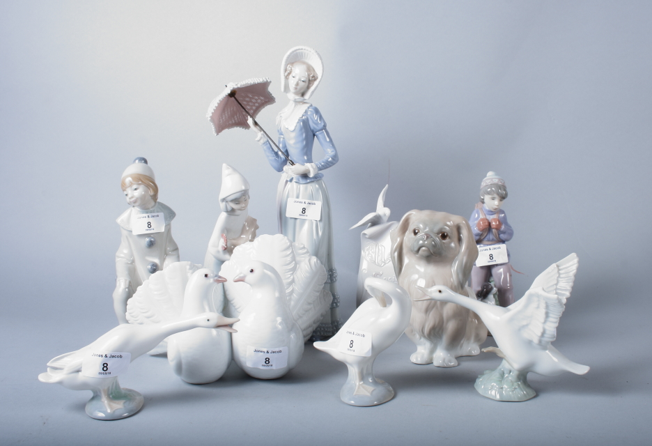 Ten Lladro porcelain figures, including "Love Doves", "Thursday Child" and others