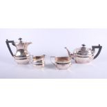 A silver plate four-piece teaset and five cases of plated flatware