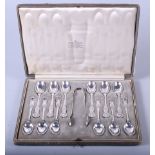 A set of twelve silver teaspoons and a matching pair of sugar tongs, William Hutton & Sons,