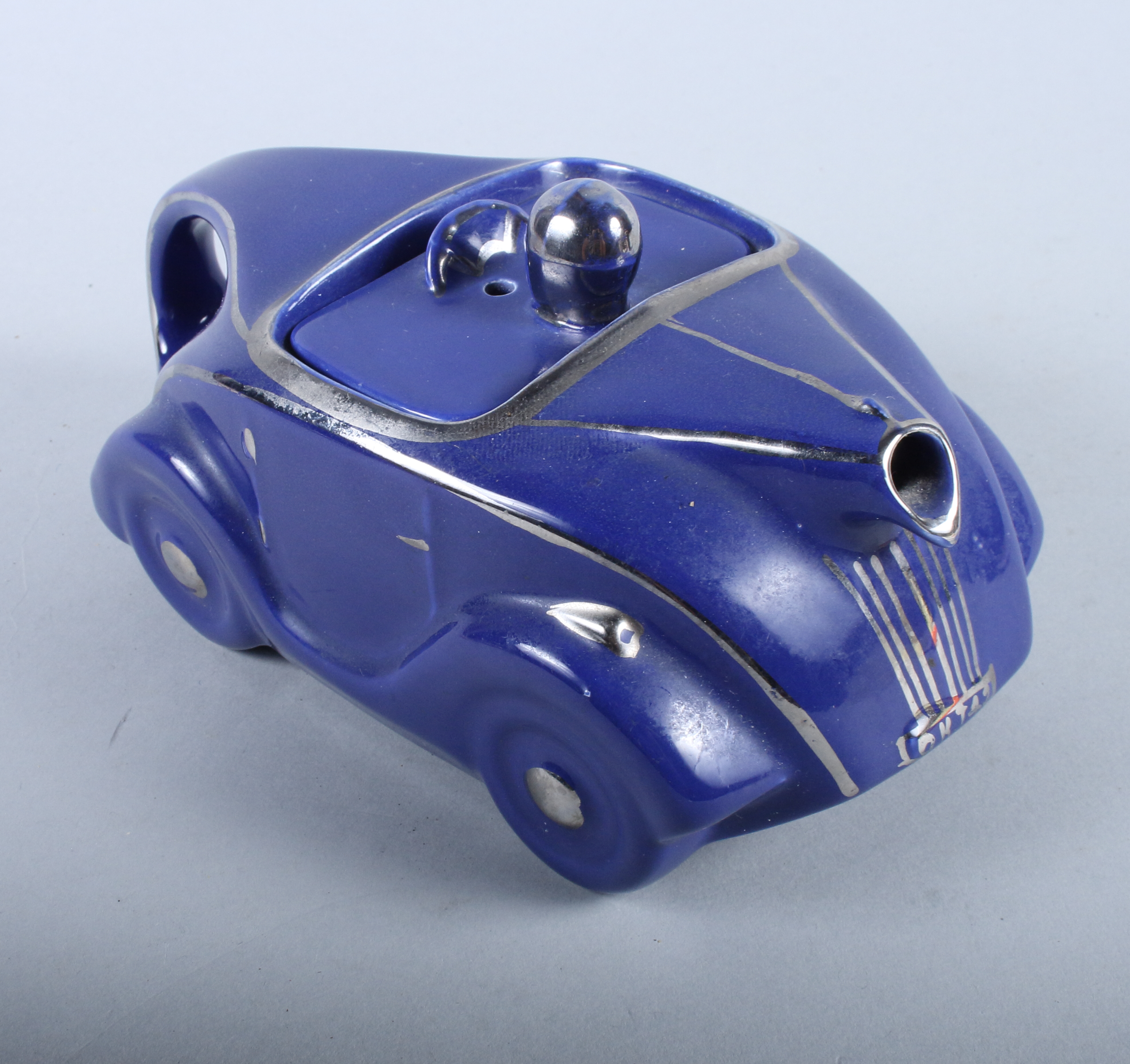 A 1930s Stabler design blue glazed racing car teapot, 9" long - Image 3 of 6