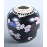 A Kangxi period Chinese porcelain ginger jar, the "ice cube" decoration over-painted with black